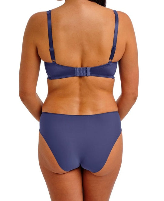 woman wearing a denim blue lace bra with matching brief