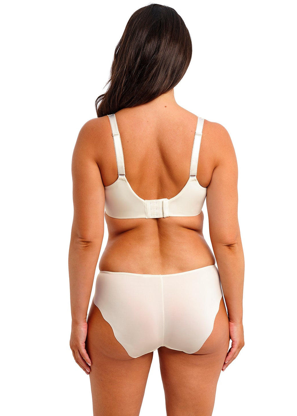 curvy woman wearing a big cup bra with embroidered flowers and lace in ivory color