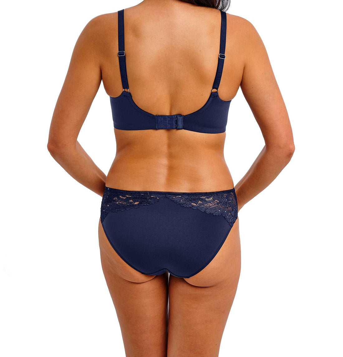 woman wearing a dark blue lace brief with little strass details