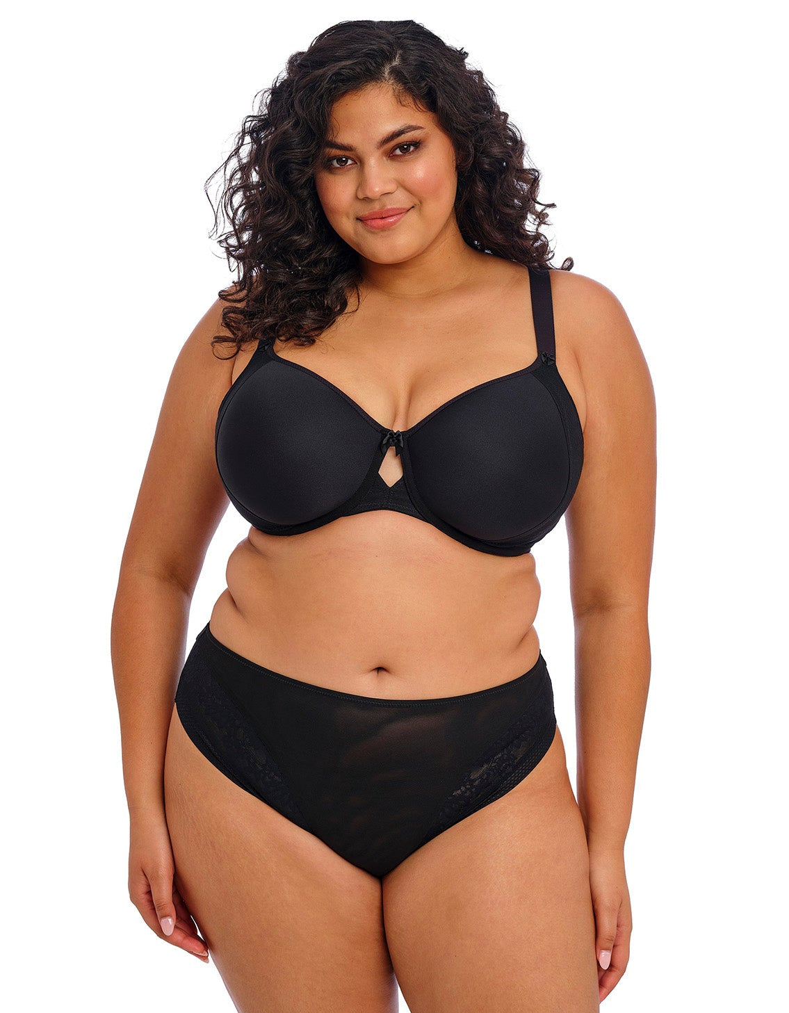 curvy woman wearing a black big cup moulded spacer bra with matching brief