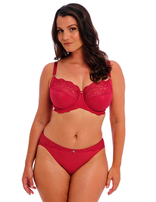 woman wearing a big cup bra with lace details in red