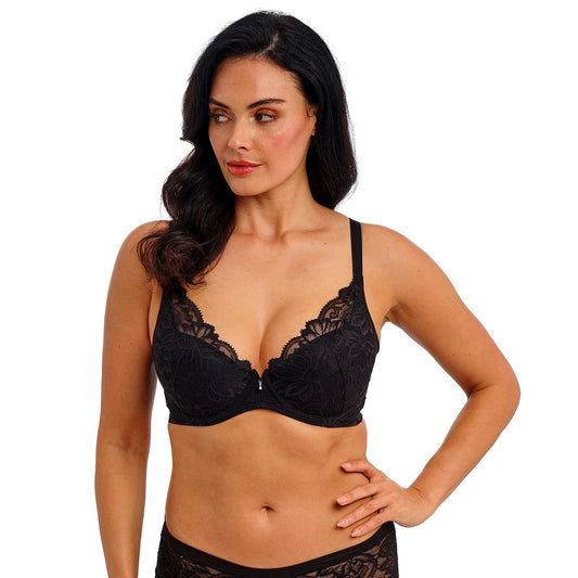 woman wearing a black lace push up bra