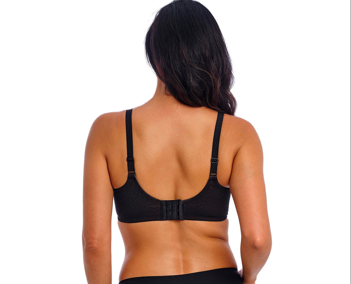 woman wearing a Black underwired contour bra with shiny dots