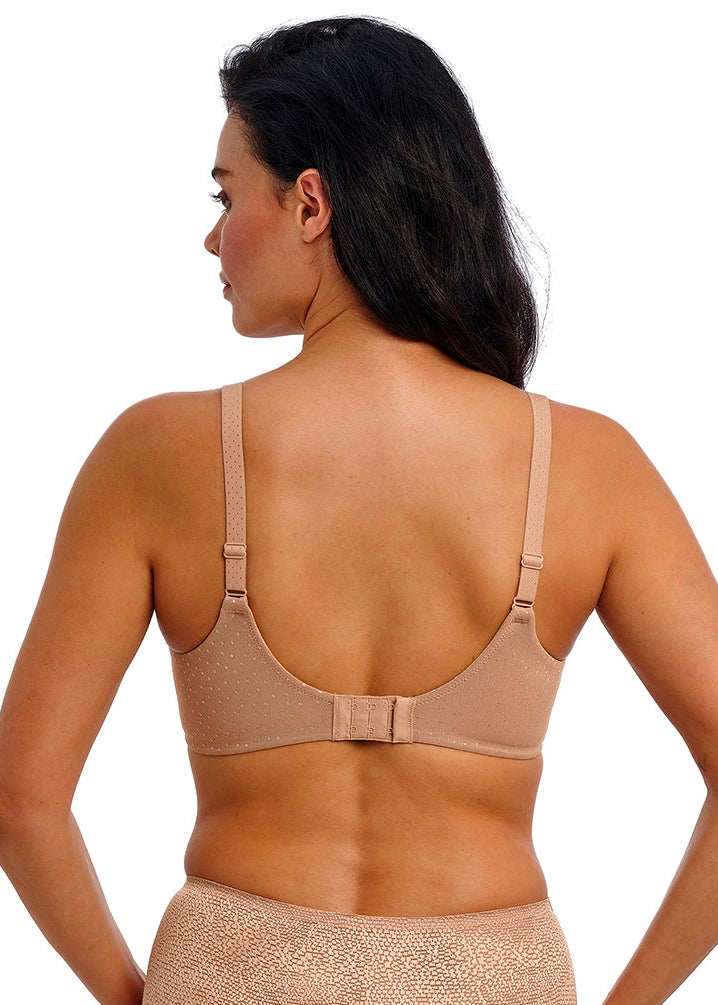 woman wearing a Nude color underwired t-shirt bra with shiny dots