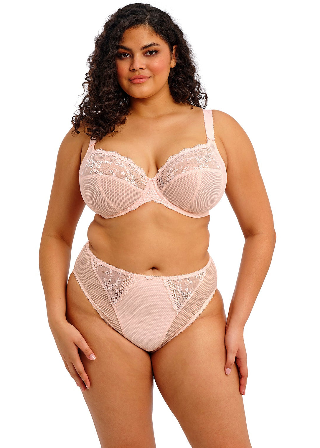 curvy woman wearing a plussize high leg brief in pink lace and mesh
