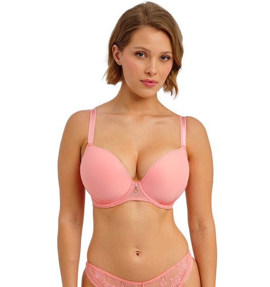 woman wearing a moulded plunge t shirt bra in peach color 