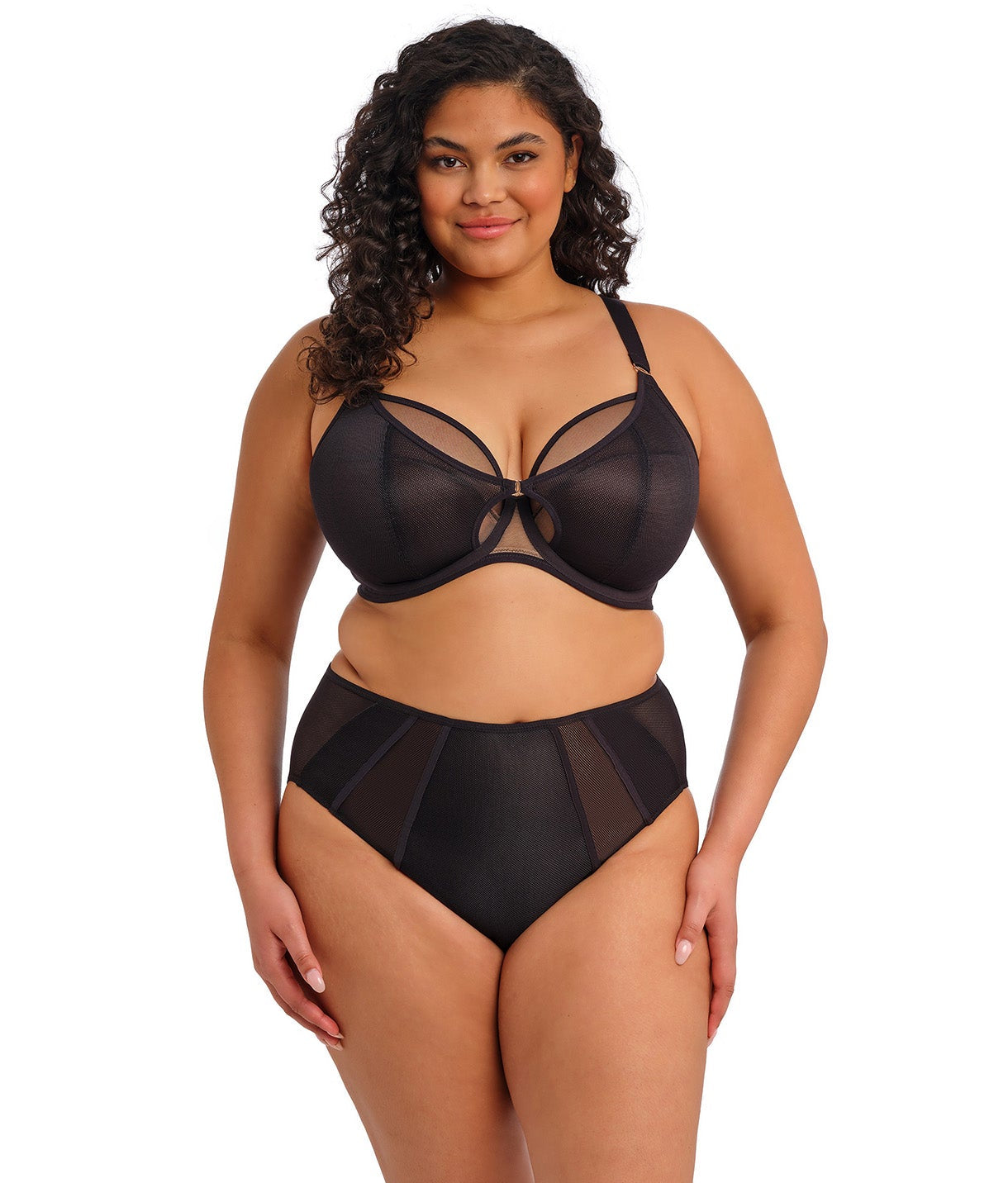 curvy woman wearing a black big cup bra in mesh