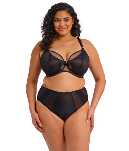 curvy woman wearing a black big cup bra in mesh
