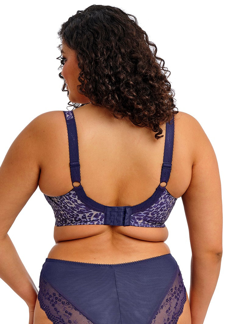 curvy woman wearing a blue purple bra with print