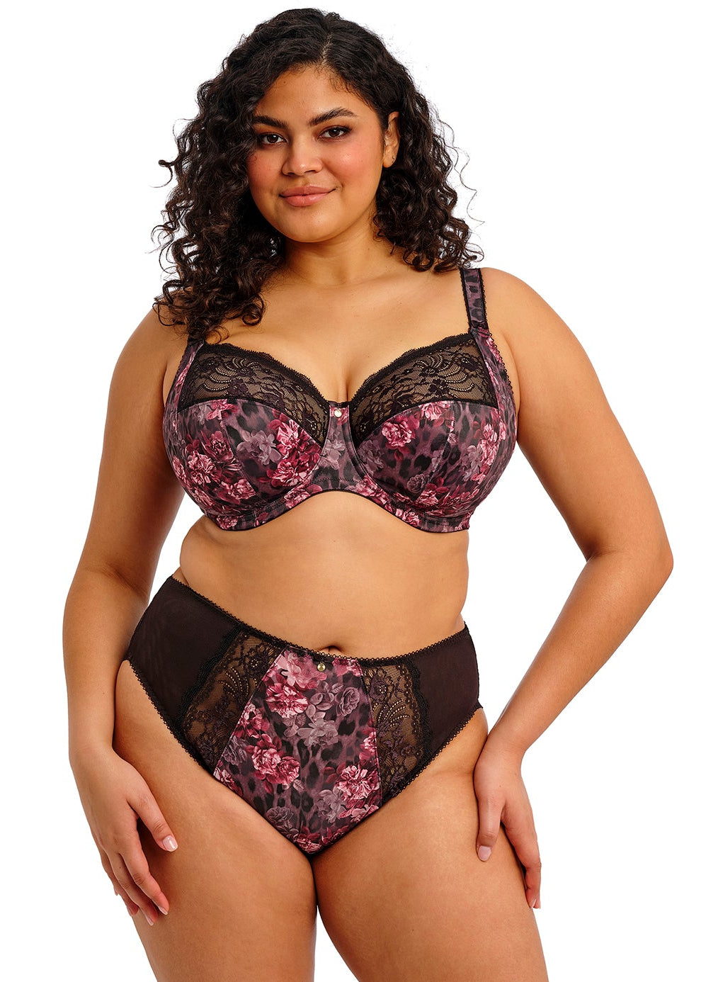 curvy woman wearing a lingerie set with dark floral print