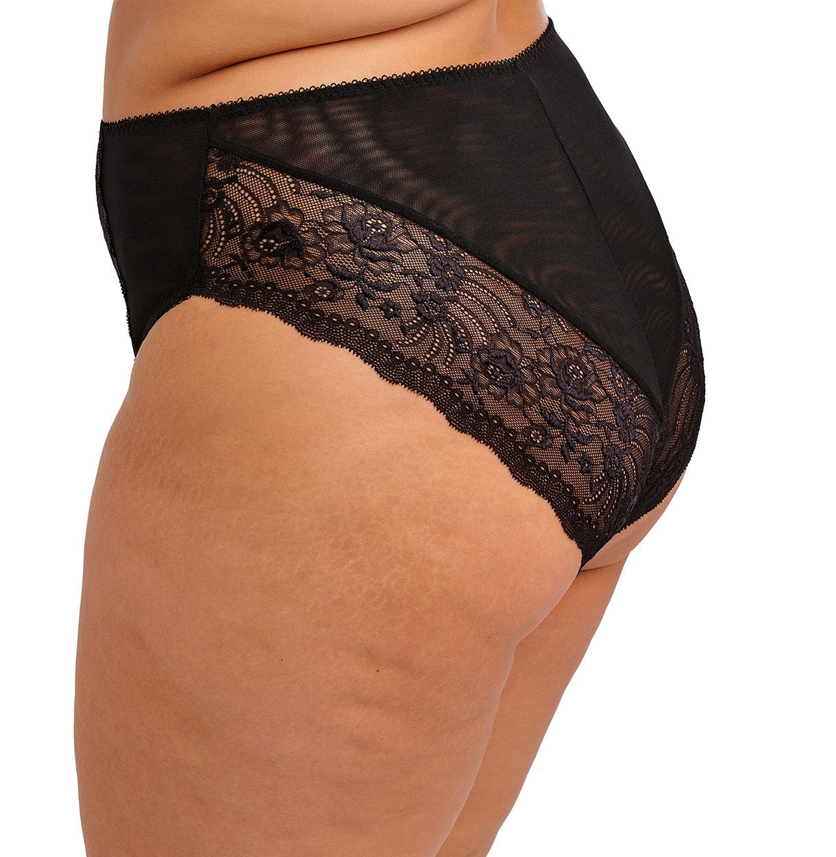 curvy woman wearing a black plussize high waist brief with mesh lace panels and printed colorfull flowers