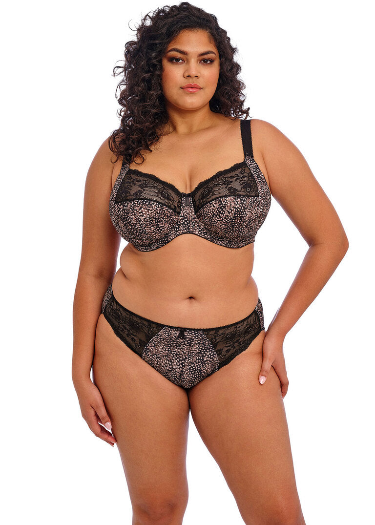 curvy woman wearing a big cup bra in ebony brown with subtile leaves print in soft pink and brown stretch lace 