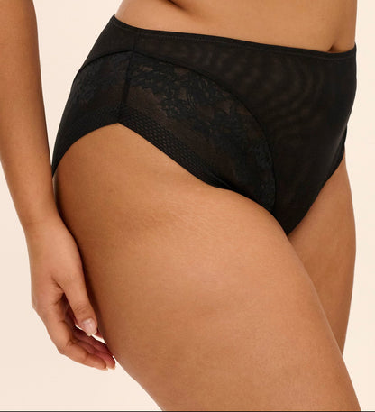 curvy woman wearing a plussize high waist high leg brief with mesh and flower details