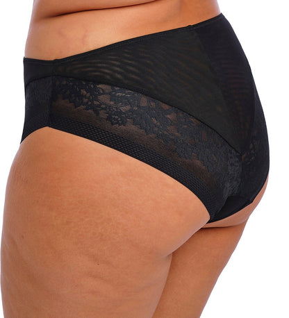 curvy woman wearing a plussize high waist high leg brief with mesh and flower details
