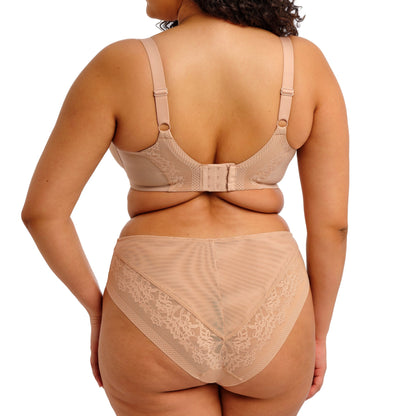curvy woman wearing Beige high-waisted lingerie bottom on a white background