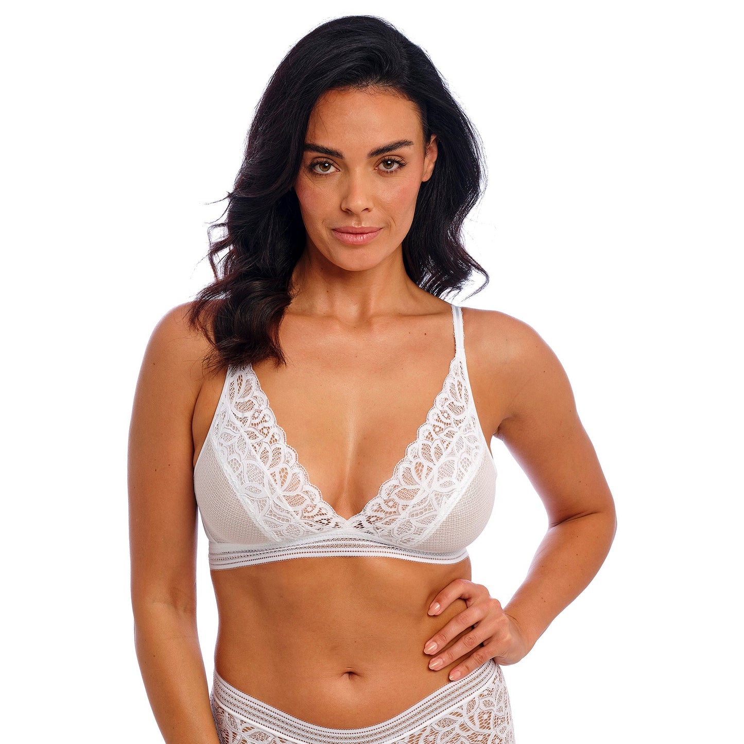 woman wearing a white lace bralette