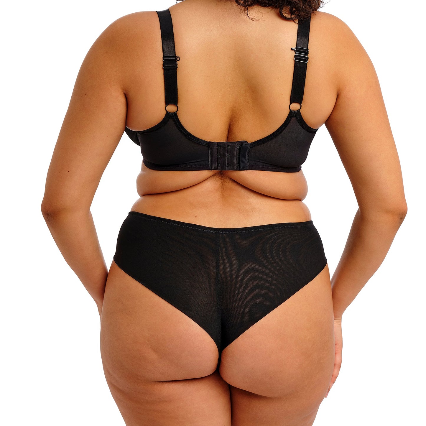 Black lingerie bottom with lace detailing on a white background