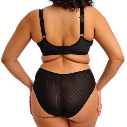 Black lingerie bottom with geometric lace pattern on a white background