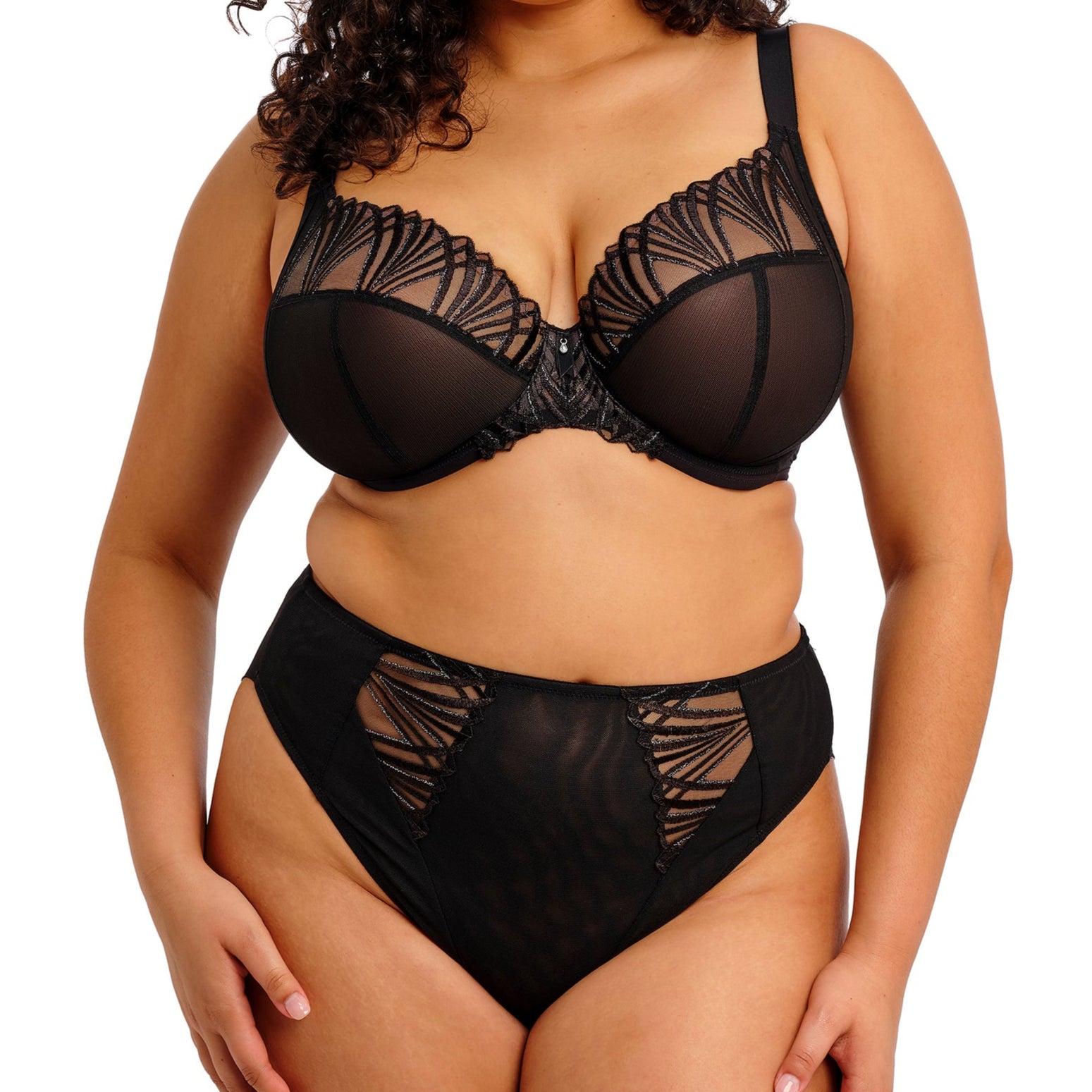 Black lingerie bottom with geometric lace pattern on a white background