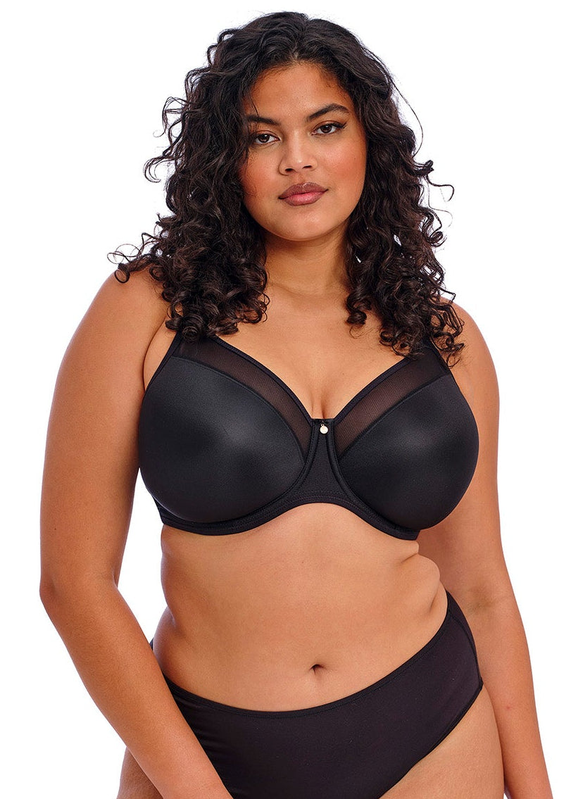 curvy woman wearing a Black bra for big cups on a white background