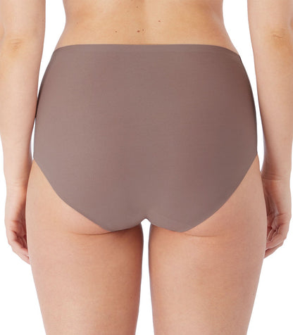 woman wearing an Invisible high waist stretch brief in taupe color