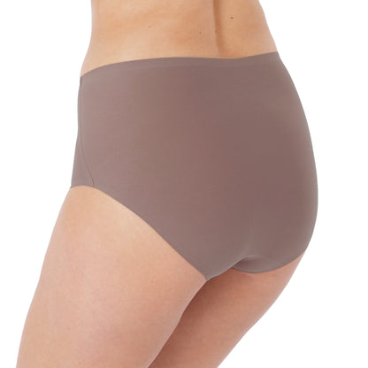 woman wearing an Invisible high waist stretch brief in taupe color