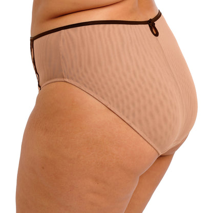 Beige underwear with black lace detailing on a white background