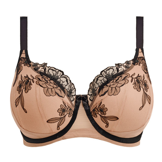 beige and black lace lingerie set on a white background