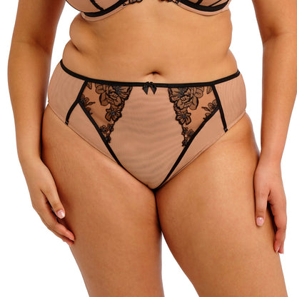 Beige underwear with black lace detailing on a white background