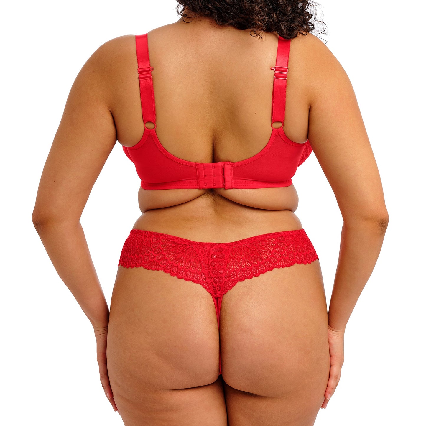 curvy woman wearing Red lace underwear on a white background