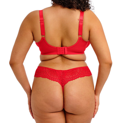 curvy woman wearing Red lace underwear on a white background