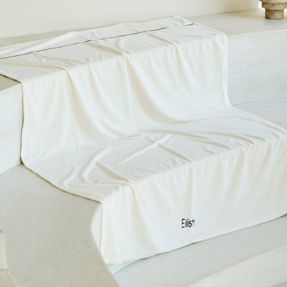 A luxury xxl beach towel for 2 persons made from baboo and cotton
