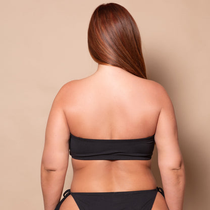 De zwarte bandeau-top met meerdere draagmogelijkheden van de Class-collectie