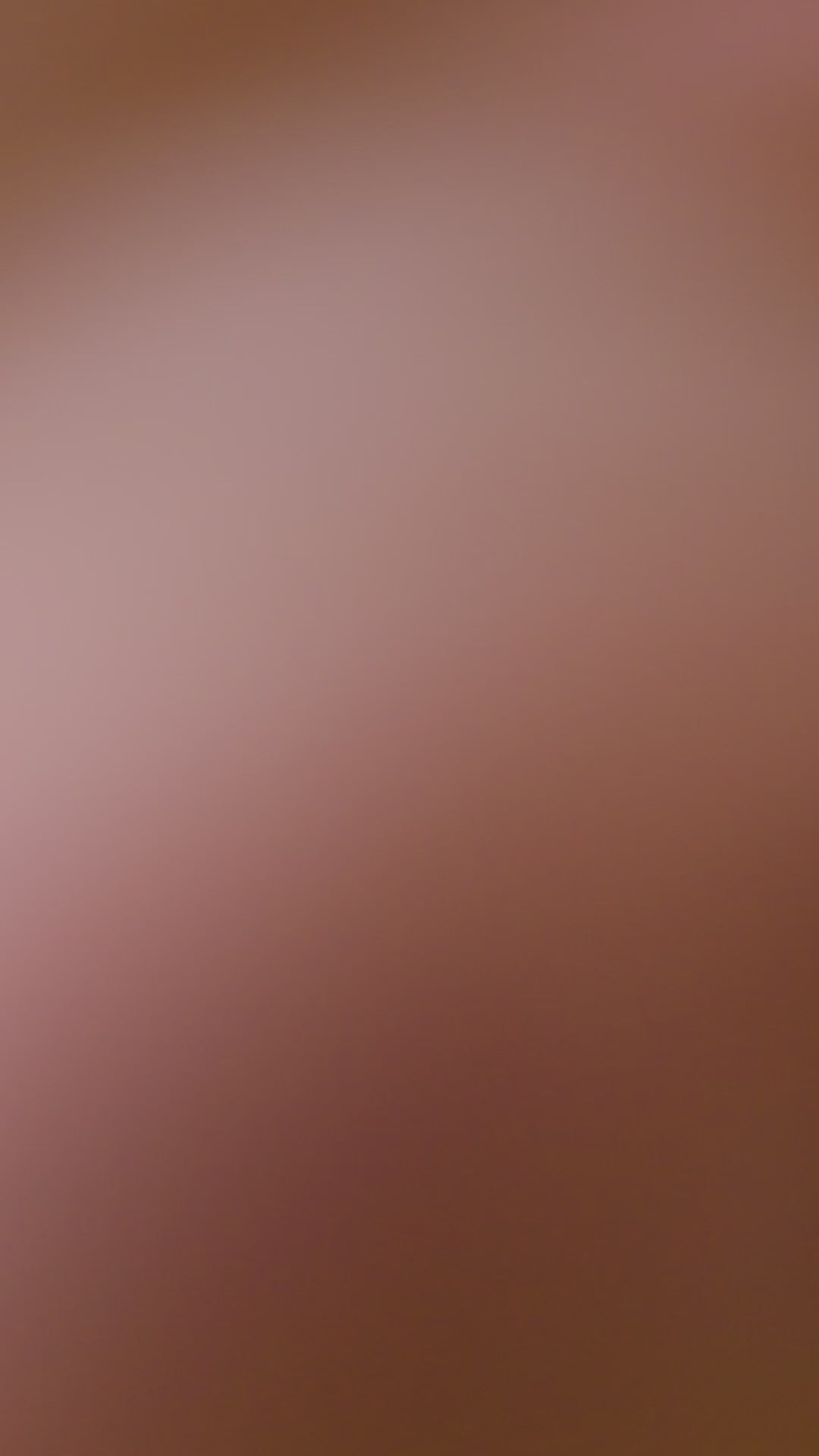 curvy woman wearing a purple lingerie set on a white background