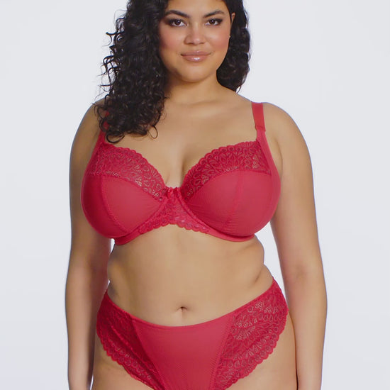 curvy woman wearing Red lace underwear on a white background