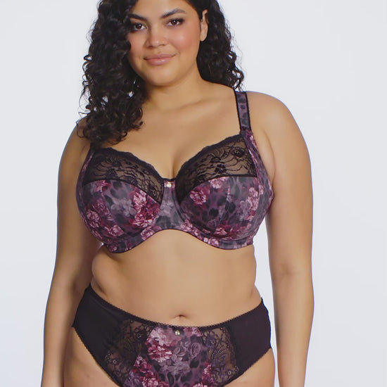 curvy woman wearing a bra and high waist brief with dark floral and lace pattern