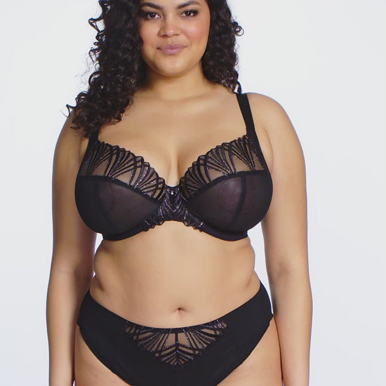 Black lingerie set with lace detailing on a white background