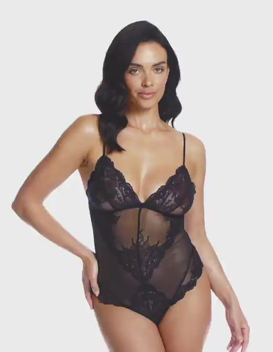 woman wearing a Black all lace bodysuit