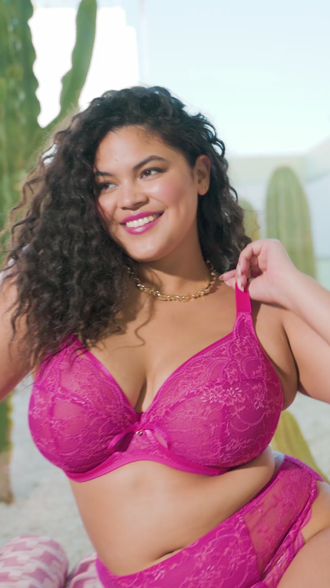 curvy woman wearing a azalea pink underwired plussize plunge bra 