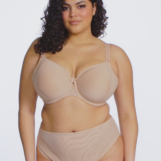 curvy woman wearing Beige high-waisted lingerie on a white background