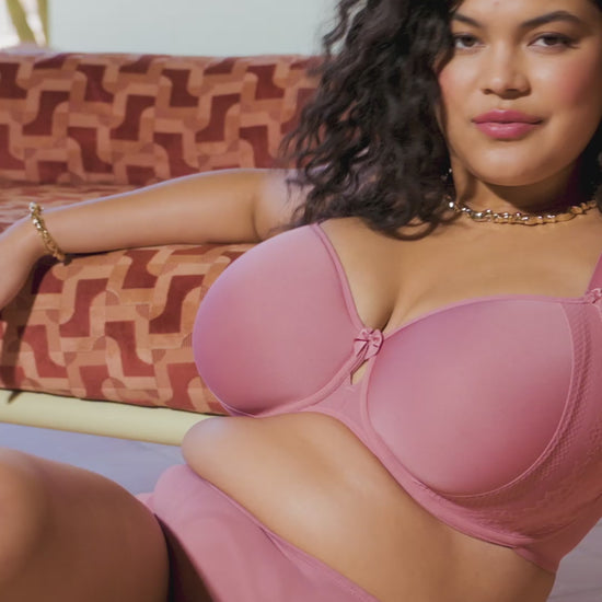 curvy woman wearing a pink big cup moulded spacer bra