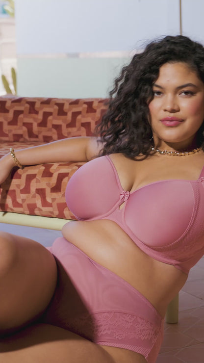 curvy woman wearing a pink big cup moulded spacer bra