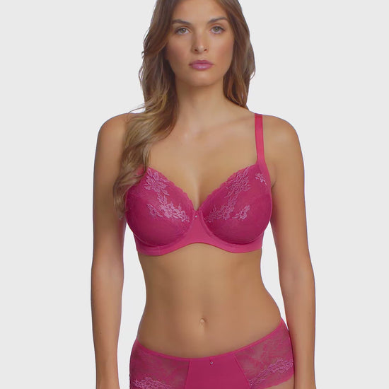woman wearing a geranium pink short with embroidered soft pink flowers 