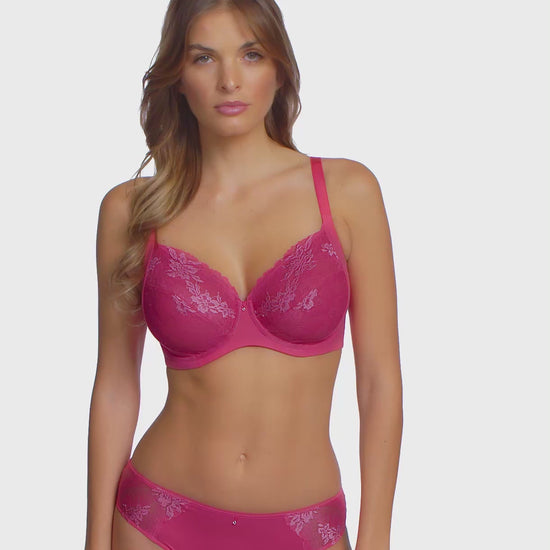 woman wearing a geranium pink bra with embroidered soft pink flowers and matching brief 