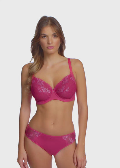 woman wearing a geranium pink bra with embroidered soft pink flowers and matching brief 